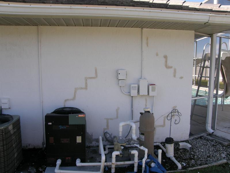 08Cracks Filled on Side of House.JPG
